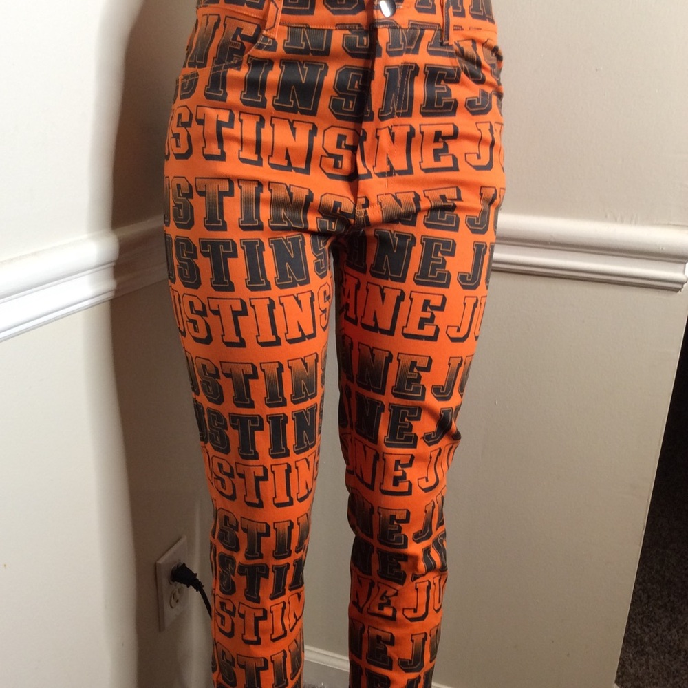 SHANE JUSTIN orange and black skinny pants